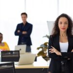 Business corporate leadership concept. Beautiful young happy smiling professional hispanic black woman in modern home office