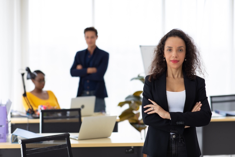 Business corporate leadership concept. Beautiful young happy smiling professional hispanic black woman in modern home office