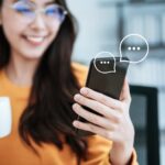 Women's hand typing on mobile smartphone, Live Chat Chatting on application Communication Digital Web and social network Concept. Work from home.