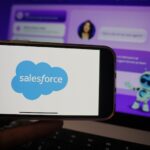 Roosendaal, The Netherlands March 10, 2025: A mobile phone displaying the logo of Salesforce, with the company website, displaying Agentforce, in the background.