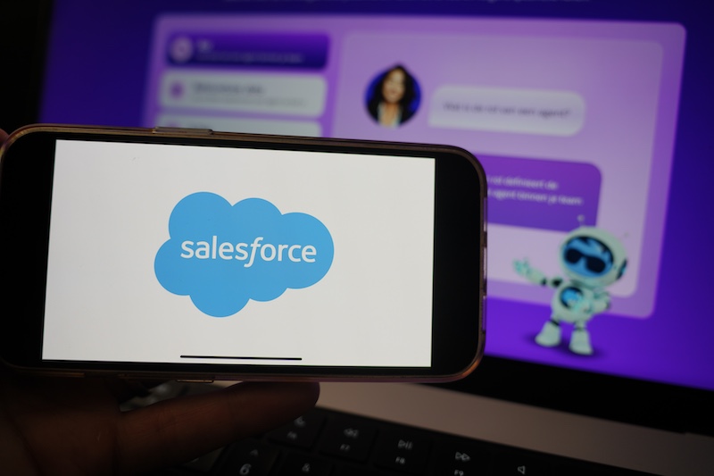 Roosendaal, The Netherlands March 10, 2025: A mobile phone displaying the logo of Salesforce, with the company website, displaying Agentforce, in the background.