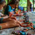 Children engaging in beadwork at a colorful craft table during a creative workshop