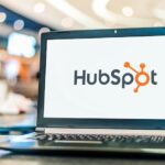 Laptop computer displaying logo of HubSpot