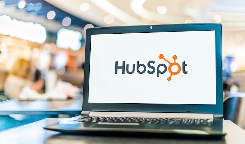 Laptop computer displaying logo of HubSpot