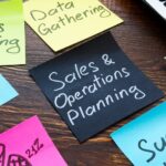 Sales and operations planning concept. Memo sticks on the desk.