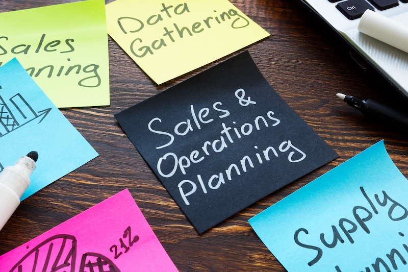 Sales and operations planning concept. Memo sticks on the desk.