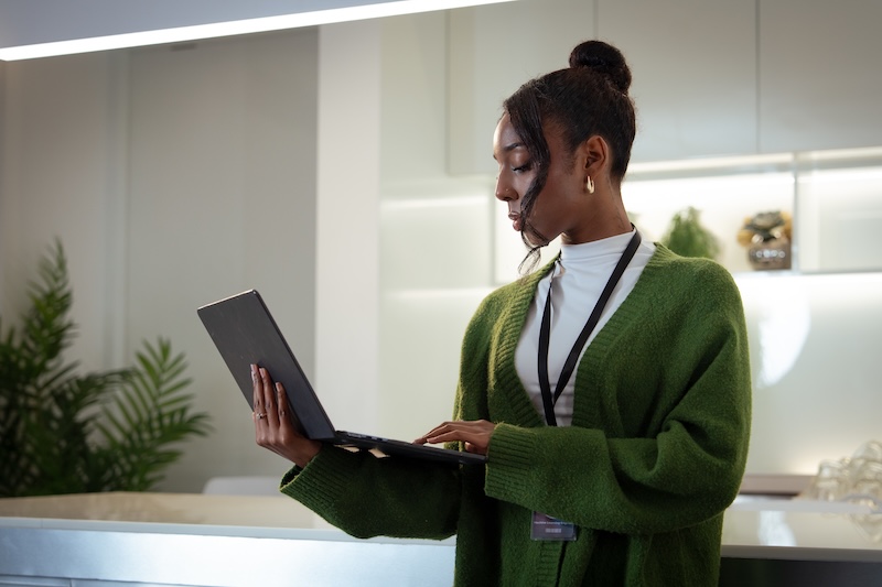 Aurasell Diverse Office Portrait of Black Businesswoman in office and thinking while working on laptop, Business marketing, social media update or networking, black woman, African female worker