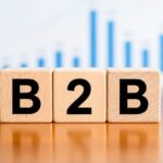 B2B Wooden Blocks with Business Chart Background