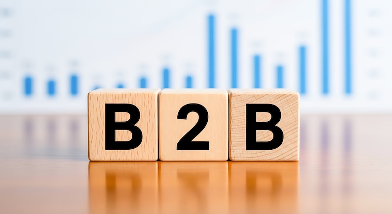 B2B Wooden Blocks with Business Chart Background