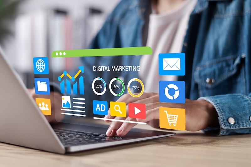 Digital marketing commerce online sale concept. Website ad, email, social network, video, SEO and business strategy. Man use laptop with digital marketing on websites.