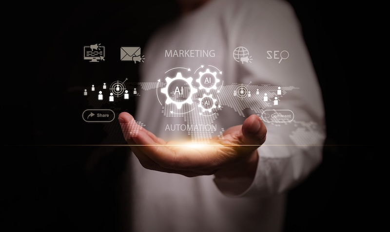 2026 Database Strategies & Contact Acquisition Benchmark Survey Marketing automation concept. Hand holding AI driven automated system with digital market, SEO, global data analytics, customer engagement platform, lead nurturing, auto workflow for advertising task