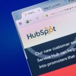 HubSpot Media Acquires Starter Story website on the display of PC, url HubSpot.com.