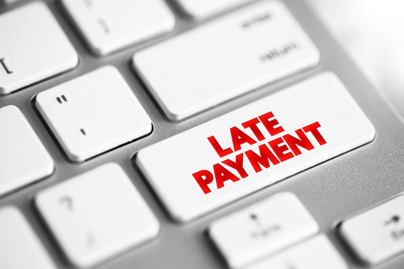 Kaplan Group Marketing Agency Late payment mount of money a borrower sends to a lender that arrives after the date that the payment was due, text button on keyboard