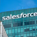 Salesforce Acquires Fin New York, USA November 23, 2025: High above a glass building near Bryant Park, the “salesforce” rooftop sign towers over New York City, symbolizing tech innovation within the iconic urban skyline.